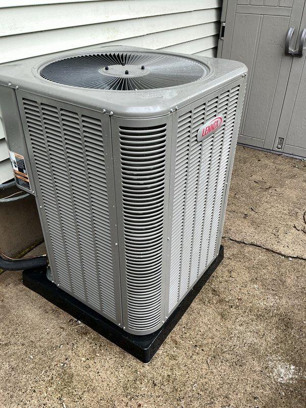 Performed annual cooling maintenance on residential Lennox condensing unit. Inspected condenser coil, fan assembly, and refrigerant lines; all components found in good operating condition with minimal wear and proper airflow. Unit operating within normal parameters with no deficiencies noted.