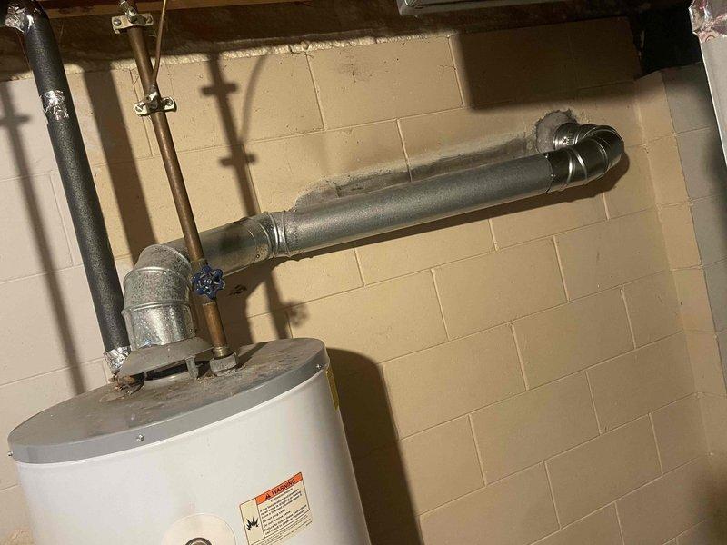 Completed full HVAC system installation including a 70,000 BTU furnace and 2-ton air conditioning unit with rear discharge configuration. Installed chimney liner for proper venting, obtained mechanical and electrical permits, and reconnected all existing utility connections. All equipment installed to manufacturer specifications and local code requirements.
