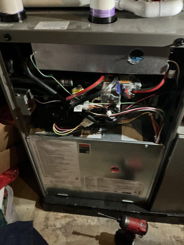 Responded to pressure switch lockout error on one-year-old furnace system previously serviced. Accessed unit interior, inspected control board, wiring harnesses, and electrical connections throughout the system. Performed diagnostic testing using digital multimeter to verify proper voltage readings and system parameters. Completed comprehensive AC tune-up and furnace maintenance inspection on both units, ensuring all components operating within manufacturer specifications and resolving lockout condition.