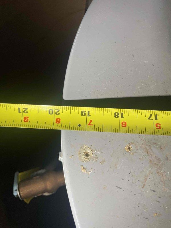 Conducted on-site assessment of leaking tanked water heater in ranch-style home to provide replacement estimate. Measured existing unit dimensions and documented current installation configuration, including pipe connections and temperature/pressure relief valve setup. Evaluated mechanical room conditions and clearances to determine appropriate replacement specifications for standard tank-type water heater system.
