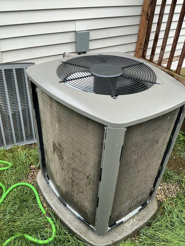 Completed comprehensive ComfortGuard annual maintenance package on 3-year-old forced air system including furnace and air conditioning units. Performed full AC tune-up protocol with refrigerant level verification, electrical connection inspection, condenser coil cleaning to remove accumulated dirt and debris, and airflow testing. Both heating and cooling systems inspected and confirmed operating within manufacturer specifications with no deficiencies noted.