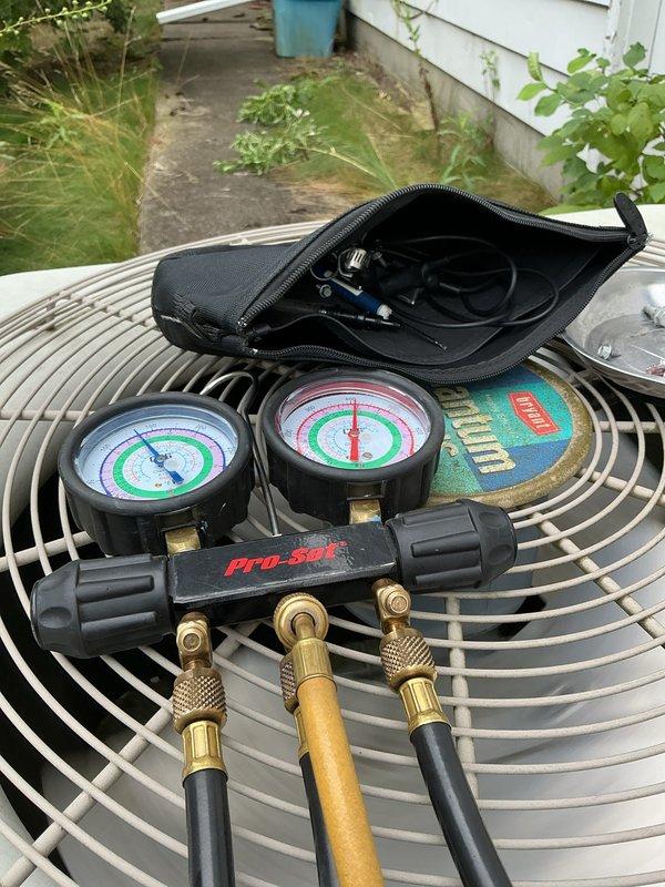 Completed annual cooling maintenance on residential air conditioning system. Performed comprehensive system inspection including pressure and temperature readings using manifold gauge set to verify proper refrigerant charge and system operation. Replaced air filters and evaporative cooling pads as needed. Inspected condenser unit exterior components, refrigerant line connections, and brass service valves for proper operation and secure fittings. Verified all electrical connections, tested system performance parameters, and confirmed unit is operating within manufacturer specifications for the cooling season.