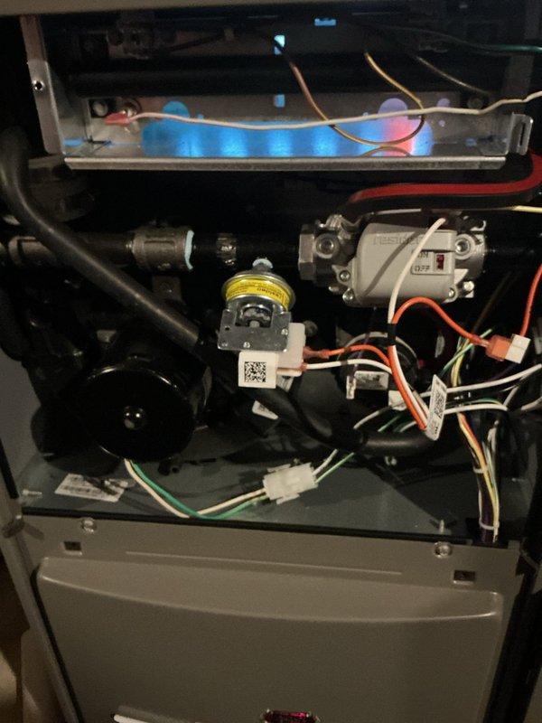 Completed annual HVAC maintenance inspection on gas furnace system. Removed access panels to inspect all internal components including burner assembly, blower motor, capacitor, gas valve, and electrical connections. Verified proper operation of all mechanical and electrical systems, checked wiring harnesses and connections for secure fit and signs of wear, and inspected heat exchanger chamber. All components found to be in satisfactory working condition with normal operational wear. System tested and returned to service.