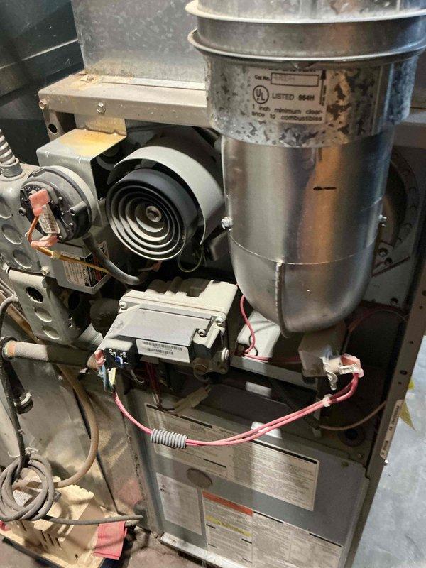 Completed comprehensive AC tune-up and furnace maintenance on aging system with 10-year-old furnace and 15-year-old air conditioning unit, both currently operational. Performed full inspection of indoor furnace components including draft inducer motor, control board, electrical connections, and ductwork; all components showed normal wear consistent with age. Inspected outdoor condenser unit positioned against foundation; noted weathered exterior casing and significant vegetation overgrowth restricting airflow around unit. Cleared debris and vegetation from condenser perimeter to restore proper clearance for optimal performance. Evaluated overall system condition and provided professional assessment of remaining service life; discussed replacement timeline considerations given equipment age, particularly the 15-year-old AC unit approaching typical end-of-life expectancy. Presented upgrade options for both furnace and air conditioning replacement to improve efficiency and reliability.