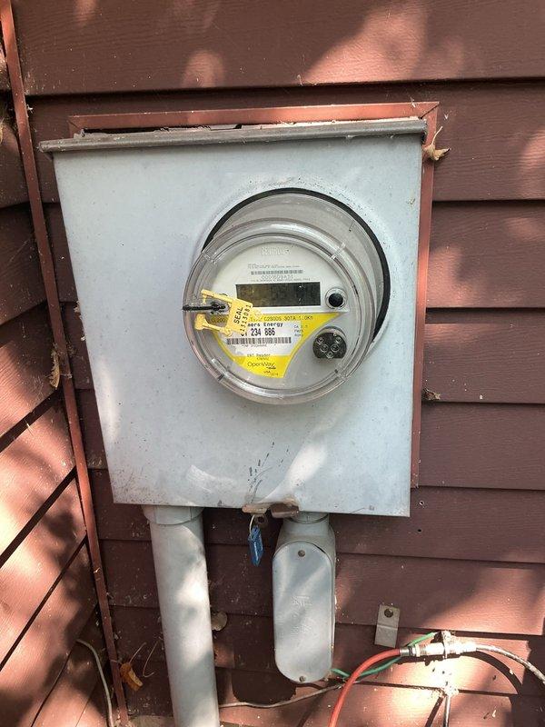Completed comprehensive electrical panel upgrade estimate for residential property, including assessment of existing interior breaker panel and exterior meter enclosure. Evaluated current electrical infrastructure to determine requirements for main panel replacement and installation of dedicated sub-panel for air conditioning system. Documented existing panel configuration, weathered exterior meter housing with visible deterioration, and electrical service entrance conditions to provide accurate scope of work for complete system upgrade.