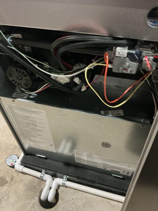 Completed comprehensive Air Care Heating and Cooling recurring maintenance service on Lennox HVAC system model AHC8/72-5. Performed thorough inspection of indoor air handler unit, examining electrical connections, blower assembly, and internal components, with all wiring and relays found in proper working condition. Inspected outdoor condensing unit including compressor, fan operation, refrigerant lines, and condensate drainage system, verifying proper function and documenting system condition with photographic records.