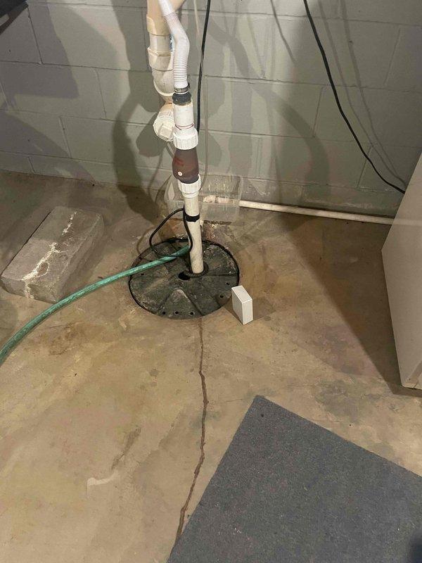 Conducted on-site assessment for furnace and air conditioning replacement estimate at basement location. Evaluated existing 1983 air conditioning unit and 2008 oil-fired furnace, both currently operational. Documented equipment dimensions, clearances, and existing ductwork configuration including plenum measurements. Assessed utility area infrastructure, drainage systems, and spatial requirements for new equipment installation.