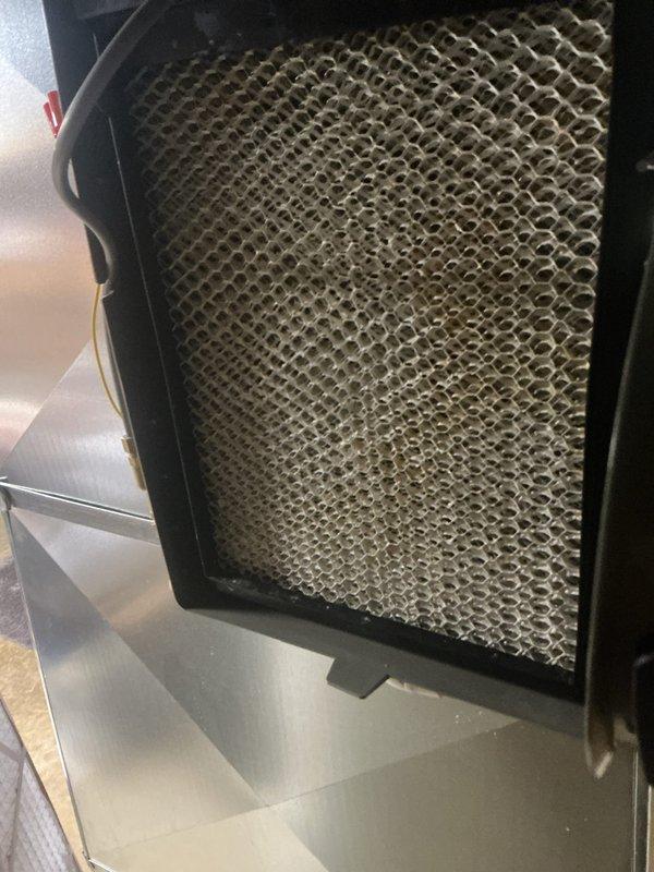 Completed ComfortGuard AC-only maintenance service during rescheduled appointment after previous visit was postponed due to inadequate ambient temperature conditions. Inspected cooling system components, replaced heavily contaminated air filter showing significant dust and debris accumulation, and verified Lennox thermostat operation displaying proper cooling mode function at 72°F setpoint.