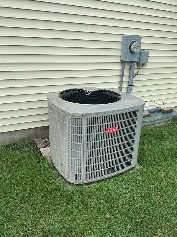 Completed annual maintenance on residential central air conditioning system. Performed comprehensive tune-up including inspection of outdoor condenser unit, verified electrical connections at disconnect box and conduit, checked refrigerant levels, cleaned condenser coils, inspected fan motor and blade operation, tested capacitor and contactor function, verified proper airflow through condenser grilles, and confirmed system operational status. Unit operating within normal parameters at time of service completion.