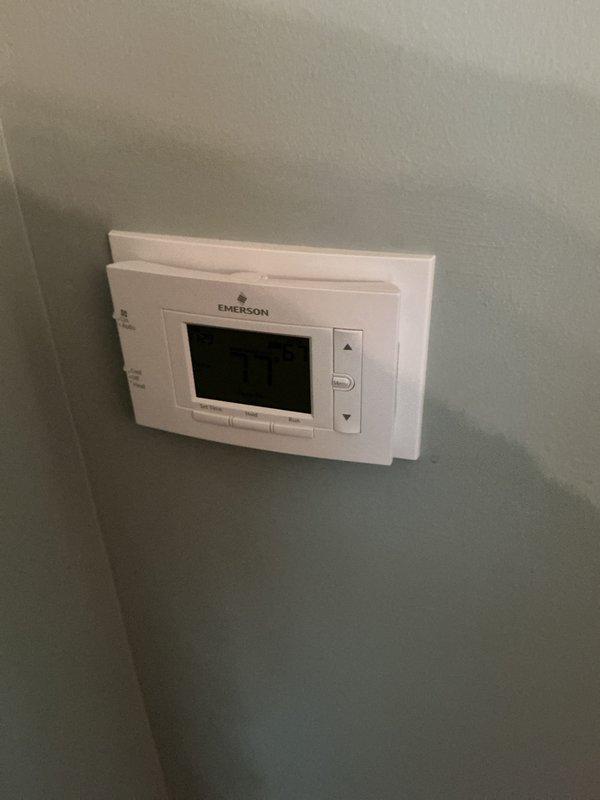 Completed annual cooling maintenance on residential HVAC system. Inspected outdoor condenser unit and indoor thermostat, replaced air filter, and verified proper system operation. All equipment found in good working condition with no issues identified.