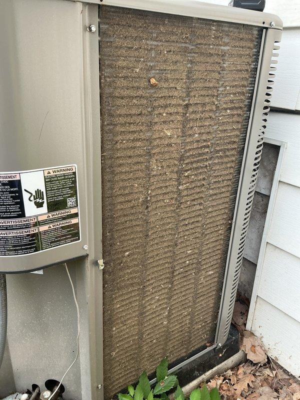 Completed routine Air Care Maintenance on residential HVAC system. Inspected outdoor condensing unit and found heavily soiled condenser coil with significant dirt and debris accumulation affecting airflow efficiency. Cleaned condenser coil and removed organic debris from base of unit. Replaced two dirty pleated air filters with accumulated dust and particulate matter. Verified proper system operation upon completion of maintenance tasks.