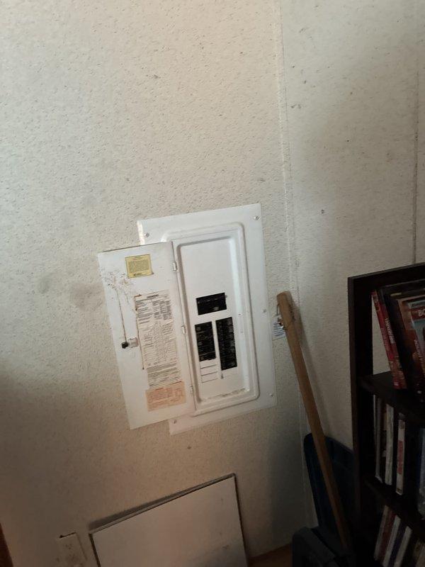Conducted comprehensive assessment of existing HVAC system for full replacement estimate. Central air conditioning unit completely non-operational, and furnace producing excessive noise during operation with limited remaining service life. Inspected basement-mounted furnace installation, including blower assembly, internal components, and ductwork connections. Evaluated outdoor condensing unit condition and assessed electrical service panel capacity for new equipment installation. Documented existing equipment configuration and installation parameters through detailed photography to provide accurate replacement system specifications and installation requirements.
