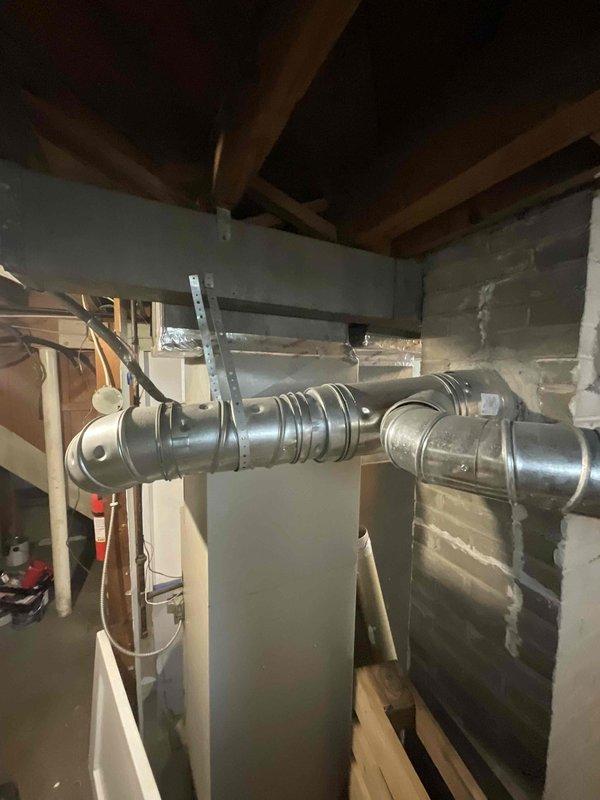 Completed comprehensive HVAC system estimate for replacement of residential air conditioning equipment. Assessed existing 1-2 year old system with condensing unit located on exterior pad and air handler installed in basement with flexible ductwork connections. Documented current equipment configuration, refrigerant line routing through foundation, and electrical service to provide replacement recommendations and specifications.