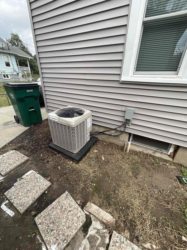 Completed comprehensive HVAC system estimate for replacement of residential air conditioning equipment. Assessed existing 1-2 year old system with condensing unit located on exterior pad and air handler installed in basement with flexible ductwork connections. Documented current equipment configuration, refrigerant line routing through foundation, and electrical service to provide replacement recommendations and specifications.