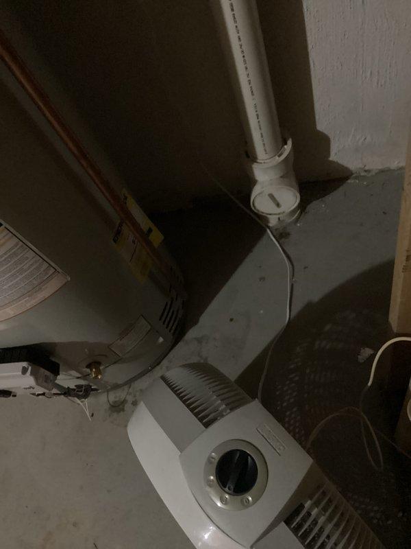 Installed a 40-gallon natural draft water heater in basement utility room, completing all mechanical connections including copper supply piping and PVC venting system. Permit was obtained prior to installation, and all work was performed to code specifications with proper reconnection of existing plumbing infrastructure.