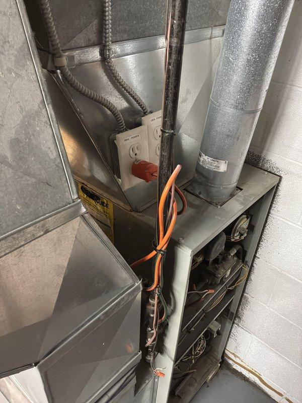 Provided comprehensive estimate for complete HVAC system replacement in basement location, including new furnace and air conditioning unit to replace existing 25+ year old equipment that is currently operational but has exceeded its expected service life. Assessed existing ductwork configuration, electrical connections, and installation requirements for proper sizing and equipment specifications.