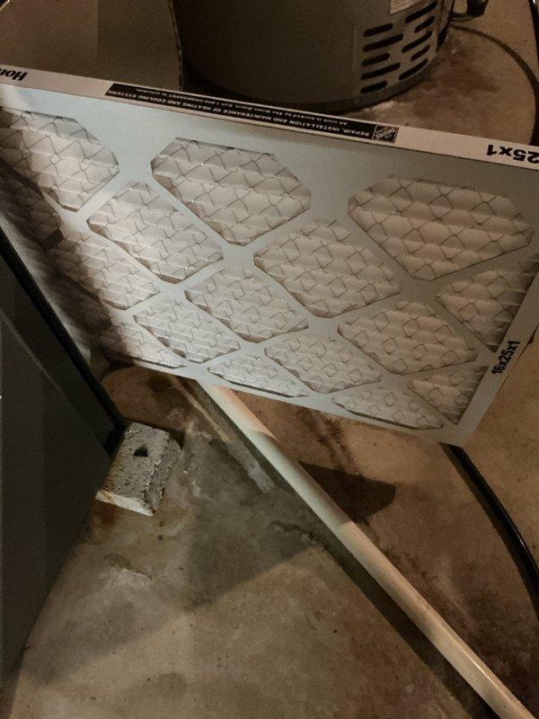Completed comprehensive AC tune-up and maintenance on an 8-year-old Rheem system. Inspected and serviced both indoor air handler unit with air filter and outdoor condensing unit, verifying proper operation of all components. System confirmed operating correctly with no issues found; unit showing normal condensation and maintained in good working condition.