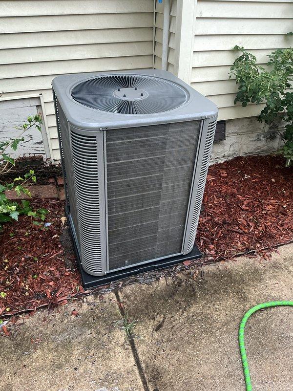 Responded to no cooling complaint on residential air conditioning system. Upon arrival, performed diagnostic evaluation of outdoor condenser unit and determined system was not operating. Identified failed component preventing unit from energizing. Replaced defective part under existing parts and labor warranty coverage. Restored power to system, verified proper operation of compressor and condenser fan motor. Conducted operational testing to confirm adequate cooling performance and proper system cycling. Unit returned to normal operation with no further issues observed.