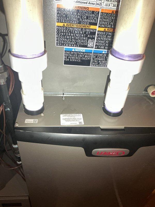 Completed warranty callback for water leaking from Lennox furnace by replacing defective drain pan (part #31c06). System inspected, new drain pan installed, and unit verified operational with no further leakage detected.