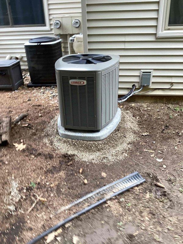 Completed full HVAC system installation including 70,000 BTU furnace, 2.5-ton air conditioning unit, and evaporator coil. Installed Lennox outdoor condensing unit in rear yard on composite pad with proper electrical disconnect and conduit routing. Connected all refrigerant lines, condensate drainage to floor drain, and verified proper airflow through system. Obtained mechanical permit prior to installation and ensured all components met code requirements for residential application.