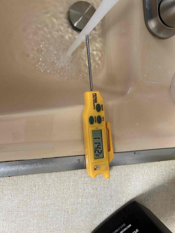 Performed temperature adjustment on recently installed tanked water heater. Verified hot water outlet temperature at fixture using calibrated digital thermometer, recording initial reading to ensure proper system performance. Adjusted thermostat setting to achieve optimal temperature output per manufacturer specifications and safety standards. Confirmed temperature stabilization throughout distribution system and verified proper operation of unit following initial installation service call.