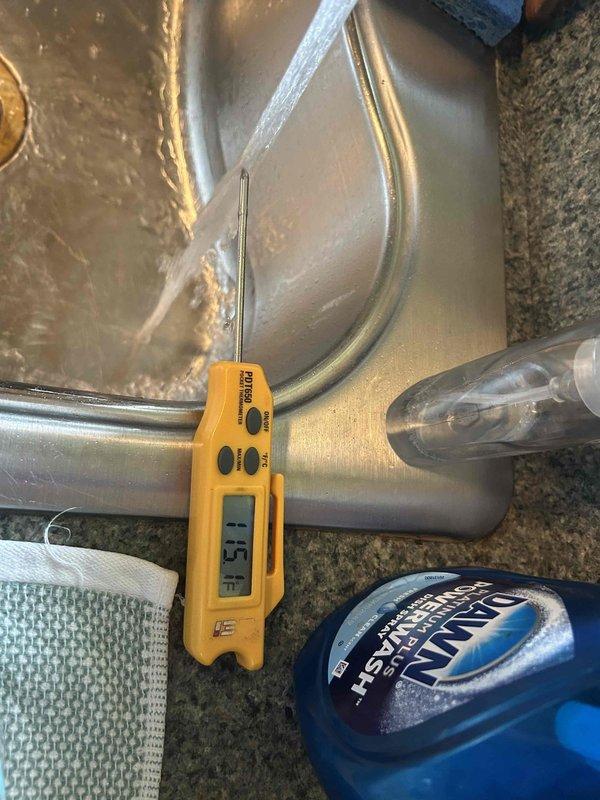 Performed temperature adjustment on recently installed tanked water heater. Verified hot water outlet temperature at fixture using calibrated digital thermometer, recording initial reading to ensure proper system performance. Adjusted thermostat setting to achieve optimal temperature output per manufacturer specifications and safety standards. Confirmed temperature stabilization throughout distribution system and verified proper operation of unit following initial installation service call.