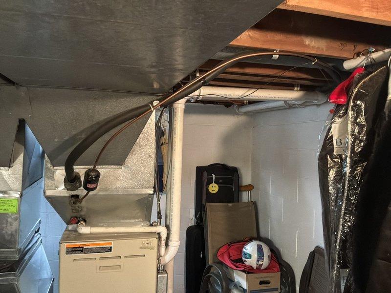 Provided estimate for complete furnace and air conditioning system replacement in basement location. Current 23-year-old equipment is operational but has reached end of service life, requiring full system upgrade to ensure continued reliable heating and cooling performance.