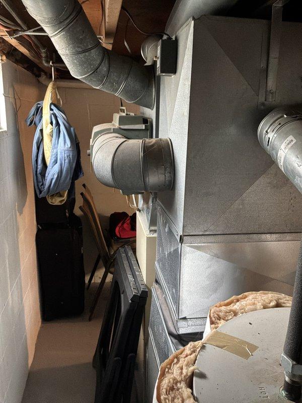 Provided estimate for complete furnace and air conditioning system replacement in basement location. Current 23-year-old equipment is operational but has reached end of service life, requiring full system upgrade to ensure continued reliable heating and cooling performance.