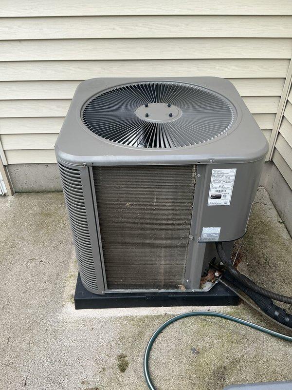 Completed annual cooling maintenance on residential HVAC system. Performed comprehensive inspection of outdoor condenser unit and verified proper operation of Lennox digital thermostat displaying 76°F ambient temperature with system set to cool mode at 66°F setpoint. All components operating within normal parameters with no service points of concern identified during this routine maintenance visit.