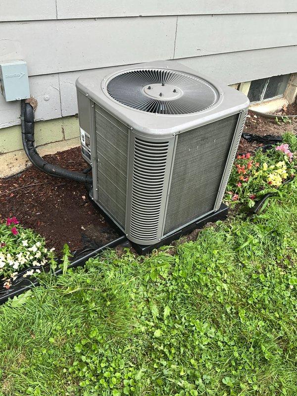 Completed comprehensive ComfortGuard Maintenance Package including AC tune-up and furnace inspection at residential property. Performed standard preventive maintenance procedures on both systems, which were operating properly with no reported issues. Documented equipment condition with photos showing outdoor condenser units with visible dirt accumulation on fins and coils requiring cleaning attention during service.