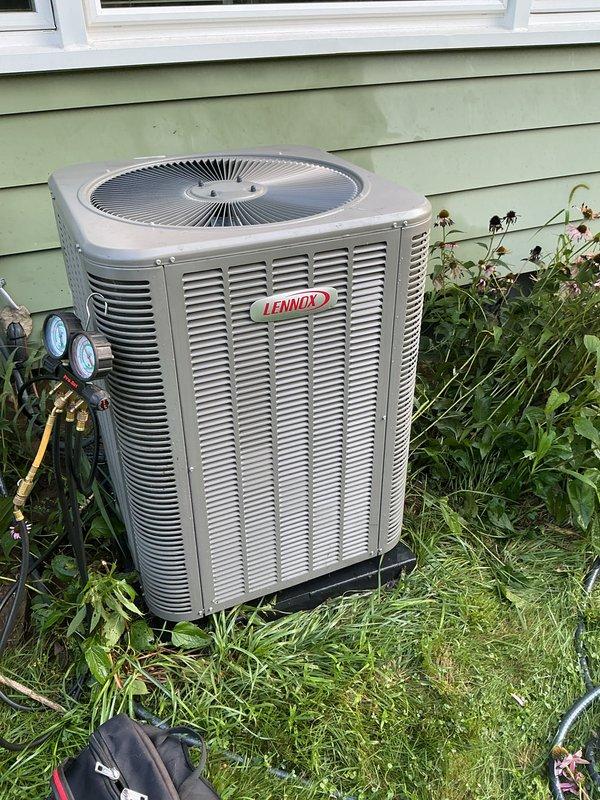 Performed scheduled air conditioning maintenance on Lennox condenser unit. Connected manifold gauges and verified refrigerant pressures and system operation. Unit required replacement of air filters and evaporator pads as noted during inspection. Completed routine ACM service checklist and documented system performance with photos for service records.