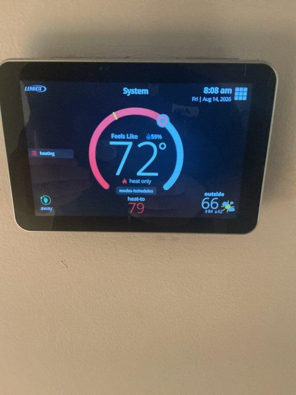 Completed comprehensive 5-year recurring ComfortGuard maintenance visit on Lennox HVAC system. Performed full system inspection including thermostat functionality verification, air filter assessment showing moderate dust accumulation, and standard preventative maintenance procedures to ensure optimal heating and cooling performance. All system components operating within normal parameters with thermostat displaying proper temperature readings and system modes functioning correctly.