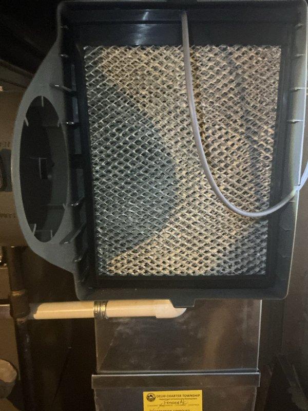 Completed comprehensive 5-year recurring ComfortGuard maintenance visit on Lennox HVAC system. Performed full system inspection including thermostat functionality verification, air filter assessment showing moderate dust accumulation, and standard preventative maintenance procedures to ensure optimal heating and cooling performance. All system components operating within normal parameters with thermostat displaying proper temperature readings and system modes functioning correctly.