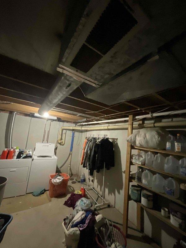 Performed site assessment for new mini-split installation in sunroom area. Evaluated basement infrastructure including existing ductwork routing, exposed joists, and available electrical pathways to determine optimal installation approach. Documented current HVAC layout and structural considerations for mini-split system versus extending existing ductwork to serve the sunroom space.