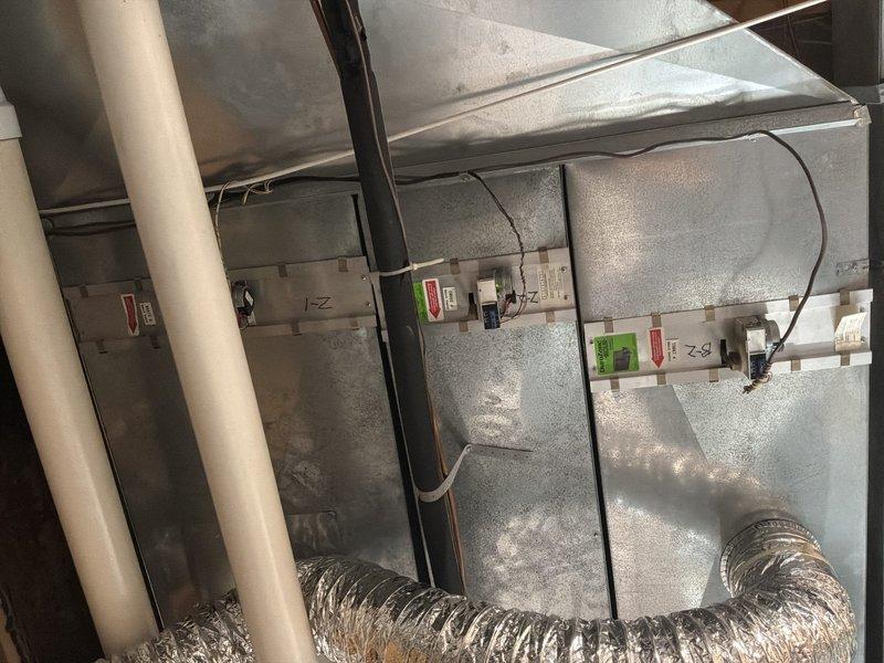 Provided estimate for replacement of natural gas furnace and air conditioning system under BOGO promotion. Current 20+ year old furnace located in basement and 8-year-old AC unit in attic are both operational but nearing end of service life. Assessed existing ductwork, electrical connections, and installation requirements for both locations including attic-mounted air handler with control relays and basement furnace with PVC venting and flexible duct connections.