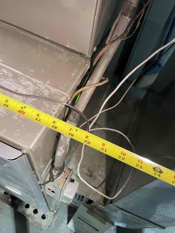 Conducted estimate for replacement of 19-year-old air conditioning and furnace system located in very small basement with limited access clearances. Both units currently operational but experiencing coil freezing issues, indicating likely refrigerant restrictions or airflow deficiencies requiring full system replacement rather than repair due to equipment age and compromised efficiency.