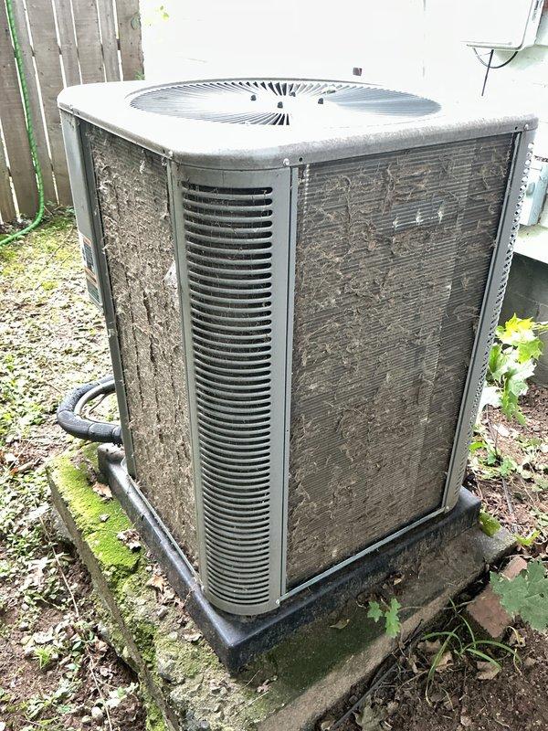Responded to service call for air conditioning system unable to cool below 75 degrees. Upon inspection, found outdoor condensing unit with significant dirt accumulation, organic growth, and debris on exterior panels restricting airflow. Indoor air filter was heavily soiled and clogged, severely limiting system airflow and reducing cooling capacity. Cleaned condensing unit exterior surfaces, removed organic matter from panels, and replaced dirty air filter with new unit. Verified proper airflow restoration and system operation. Unit cooling effectively after service completion.