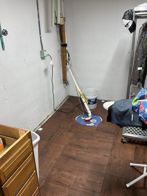 Conducted comprehensive assessment of existing HVAC system in basement mechanical room for full system replacement estimate. Evaluated current furnace unit, ductwork configuration, and water heater placement to determine optimal equipment specifications and installation requirements. Documented existing equipment conditions, spatial constraints, and necessary modifications for new system installation including proper clearances and ventilation pathways.