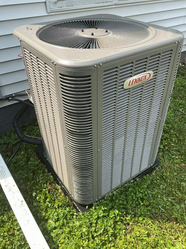 Completed annual cooling maintenance on Lennox air conditioning system. Performed comprehensive inspection of outdoor condenser unit, checking all operational components and airflow through louvered panels. Replaced air filter and evaporator pad as needed per maintenance protocol. Verified proper system operation and documented equipment condition with photographic records. Unit found in good working order with normal seasonal wear appropriate for outdoor installation.