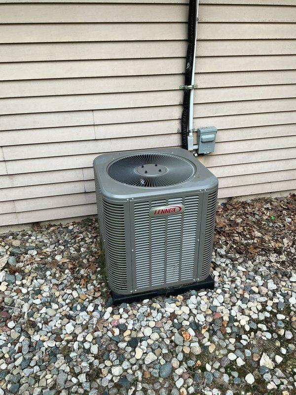 Completed comprehensive 5-year ComfortGuard maintenance service on residential Lennox HVAC system. Performed thorough inspection and preventive maintenance on both indoor furnace unit located in basement and outdoor condensing unit. System components inspected included furnace cabinet, heat exchanger, blower assembly, PVC venting, electrical connections, outdoor condenser coils, refrigerant levels, and fan motor operation. All equipment found operating within manufacturer specifications with no deficiencies noted at time of service.