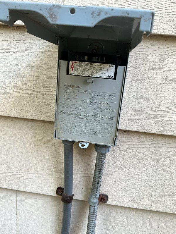 Responded to callback for air conditioning system that was previously disconnected due to freezing condition and subsequently not cooling after reconnection. Inspected outdoor disconnect switch, electrical connections, and condensate drainage system. Verified proper power supply to condenser unit and confirmed all electrical components were properly reconnected and functioning. Checked refrigerant lines, condensate drain lines, and PVC trap assembly for proper operation. System evaluated and restored to normal cooling operation, resolving the non-cooling issue reported after previous service visit.