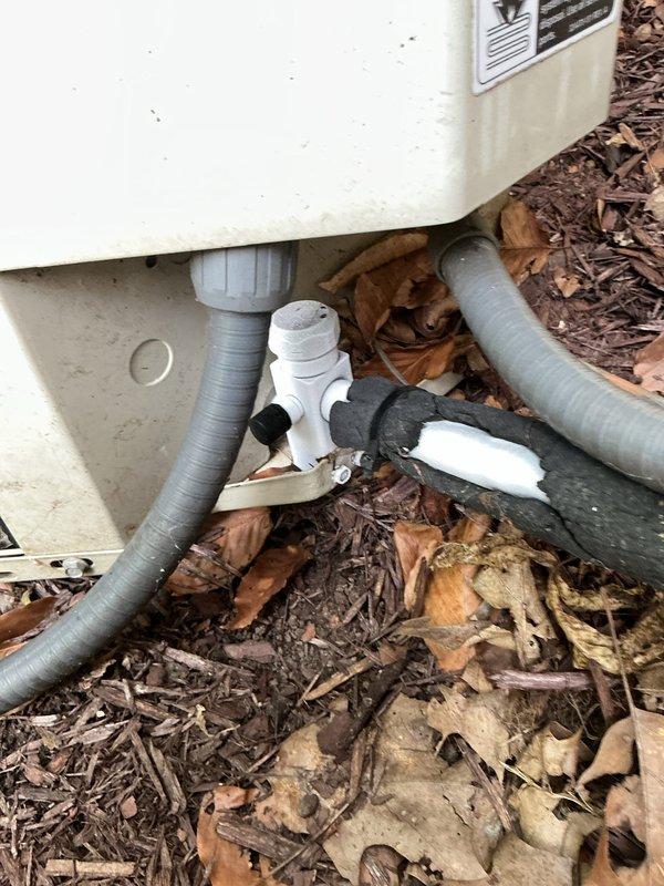 Responded to callback for air conditioning system that was previously disconnected due to freezing condition and subsequently not cooling after reconnection. Inspected outdoor disconnect switch, electrical connections, and condensate drainage system. Verified proper power supply to condenser unit and confirmed all electrical components were properly reconnected and functioning. Checked refrigerant lines, condensate drain lines, and PVC trap assembly for proper operation. System evaluated and restored to normal cooling operation, resolving the non-cooling issue reported after previous service visit.