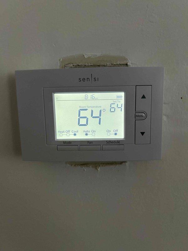 Responded to service call for insufficient cooling on 10-month-old Lennox air conditioning system with indoor temperature at 78°F despite thermostat set to 66°F. Performed diagnostic evaluation of outdoor condensing unit located in backyard and verified thermostat operation displaying 64°F at time of service. Inspected electrical connections at disconnect box, refrigerant lines, and overall system operation. Unit remains under both parts and labor warranty coverage.