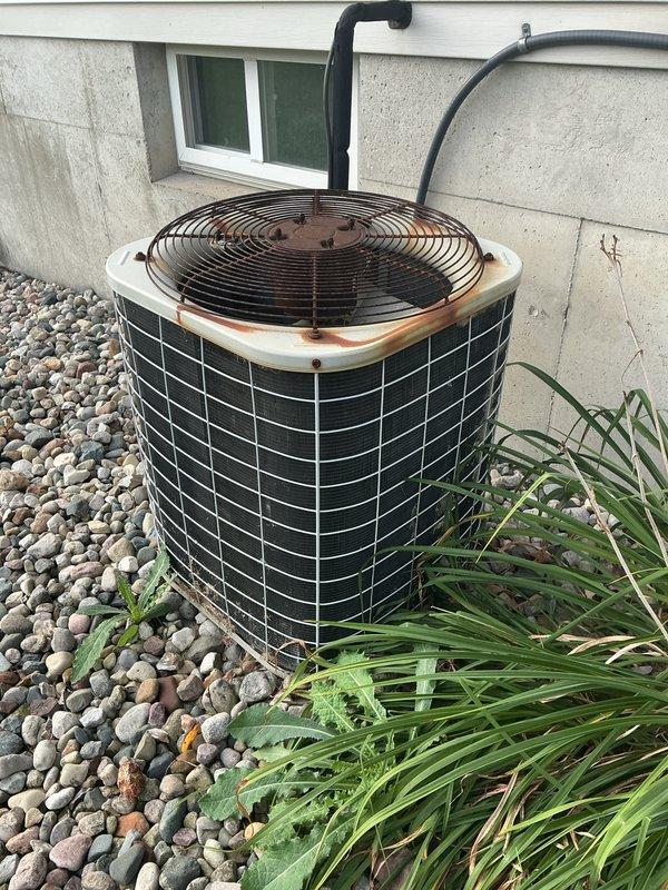 Completed routine air conditioning maintenance and tune-up on residential central AC system. Performed comprehensive inspection of outdoor condenser unit, checked refrigerant levels and pressures, cleaned condenser coils, verified proper fan operation, and inspected electrical connections. System operating within normal parameters with no deficiencies noted at time of service.