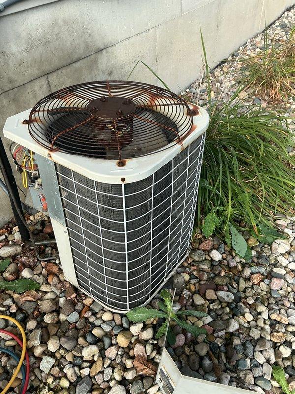 Completed routine air conditioning maintenance and tune-up on residential central AC system. Performed comprehensive inspection of outdoor condenser unit, checked refrigerant levels and pressures, cleaned condenser coils, verified proper fan operation, and inspected electrical connections. System operating within normal parameters with no deficiencies noted at time of service.