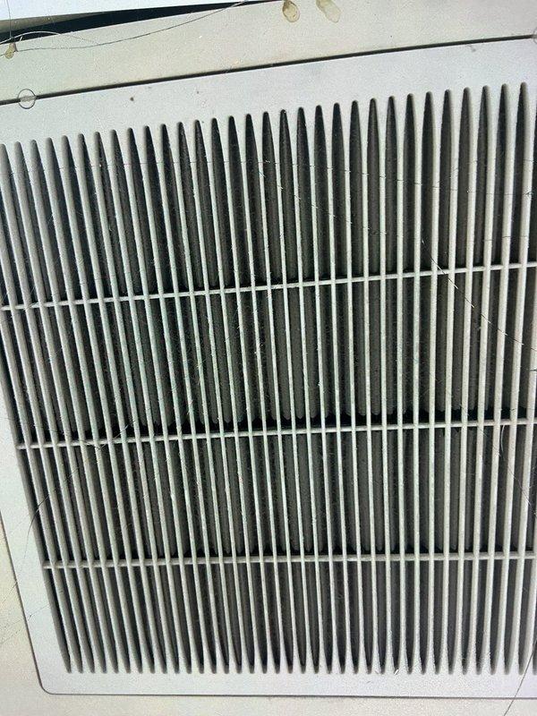 Performed diagnostic service on rooftop unit (RTU) servicing both doctor's office and retail side of commercial building. Inspected electrical connections, wiring pathways, and indoor air distribution components. Documented equipment condition including outdoor unit wiring connections through panel grommet and interior supply vent requiring cleaning due to dust accumulation.