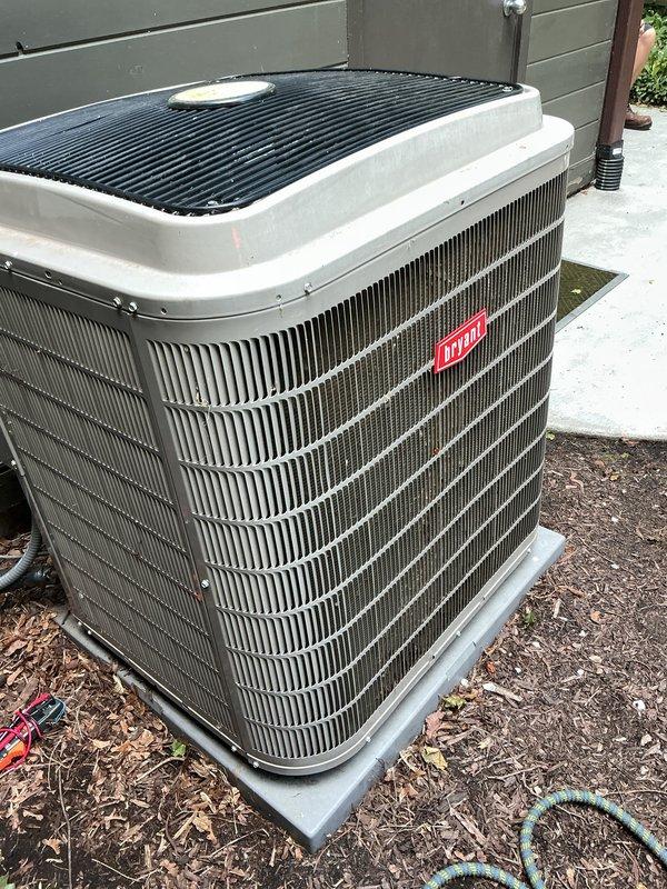 Completed annual cooling maintenance on Bryant air conditioning system. Performed comprehensive inspection of outdoor condenser unit, verified operational status of all components, and documented equipment condition with photos. Noted filters require replacement at indoor air handler.