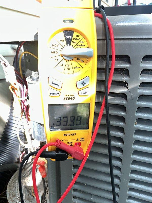 Completed annual cooling maintenance on HVAC system, including inspection of evaporator coil assembly and heat exchanger. Observed significant dust and debris accumulation on insulated interior surfaces and performed system diagnostics using digital multimeter to verify electrical components and capacitor readings. Replaced air filters as part of routine preventive maintenance to ensure optimal system performance.