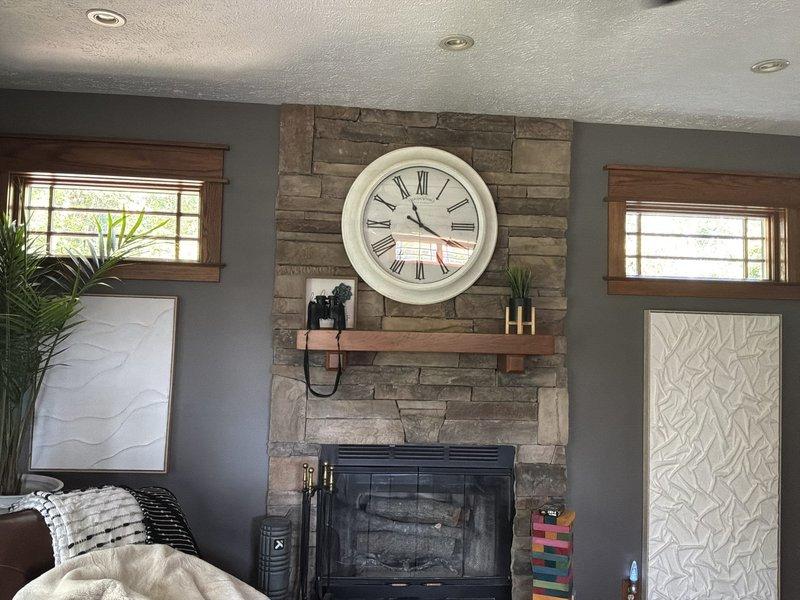 Conducted on-site assessment for multi-zone mini split installation across three-story residential property with aging HVAC equipment from 2005. Evaluated main living area featuring stone fireplace and open floor plan to determine optimal indoor air handler placement for proper air distribution and aesthetic integration. Inspected existing electrical infrastructure including main service panel with adequate breaker capacity to support new mini split system electrical requirements. Provided comprehensive estimate for complete mini split installation to be scheduled before winter season, ensuring efficient heating and cooling coverage for all three floors of the residence.