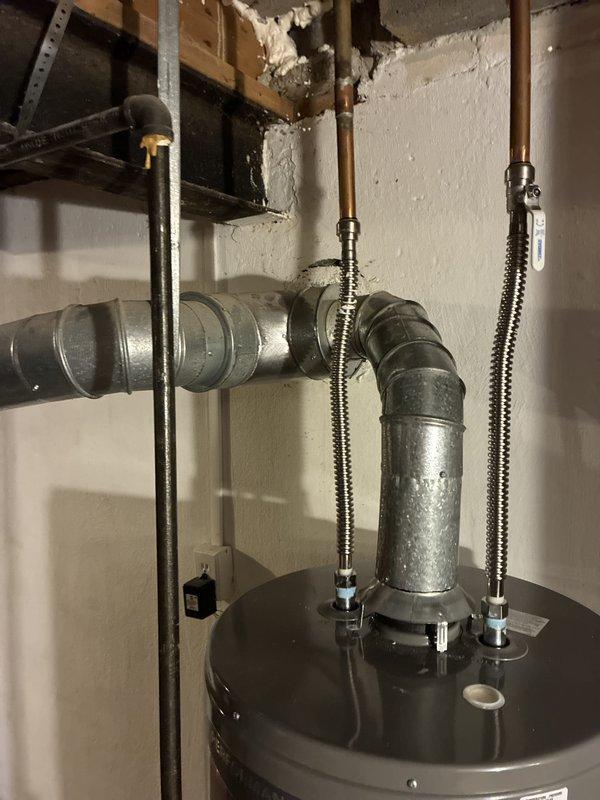 Conducted comprehensive evaluation of existing 16-year-old furnace system per customer request for full system replacement estimate. Customer was previously advised to replace heating equipment before next heating season and sought detailed quotation for complete HVAC system upgrade. Performed thorough inspection of current furnace installation, including examination of ductwork connections, ventilation components, and associated mechanical infrastructure in basement utility area. Assessed existing copper plumbing connections, galvanized ductwork elbow fittings, and overall system integration with water heating equipment. Documented current equipment configuration through photographic records showing existing installation layout, ductwork routing, and mechanical connections. Evaluated system age, condition, and replacement requirements to provide accurate full system estimate. Customer expressed intent to proceed with replacement within current season timeframe.